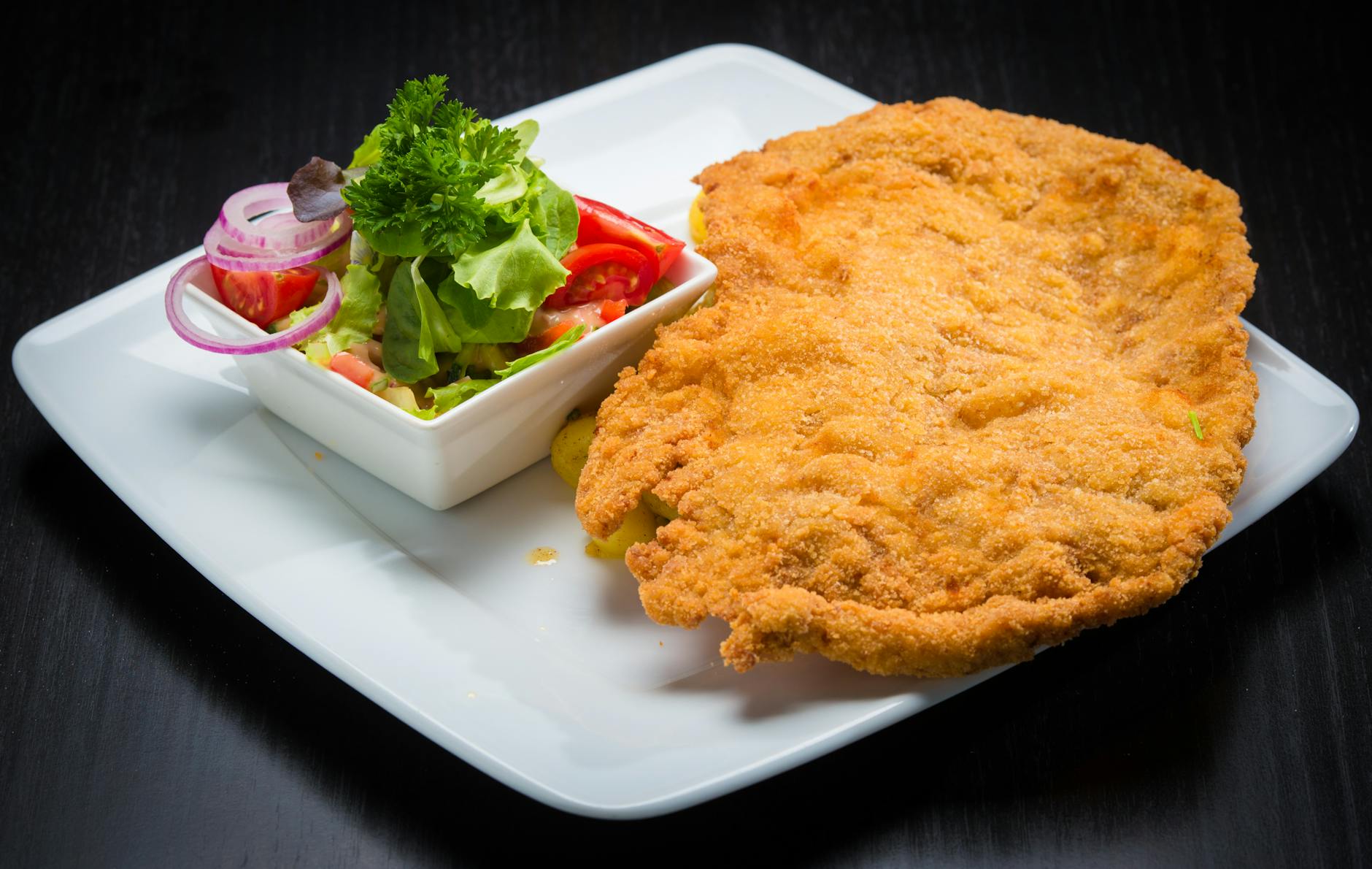 Essen mit S – goldbraunes Wiener Schnitzel mit Zitrone